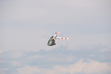 flying military transport helicopter in the sky