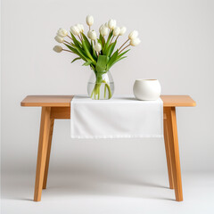 White Tulips in Glass Vase on Wooden Table with White Table Runner and Bowl