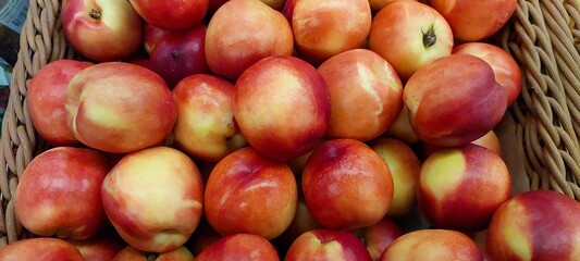 Fresh Nectarines Available for Sale at a Local Grocery Store in the Afternoon