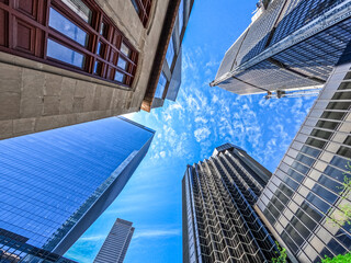 Montreal skyline seen from streets looking up at buildings