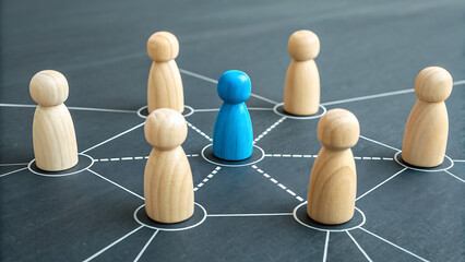 Obraz premium Network of Leadership: A captivating overhead shot showcases a network diagram, with wooden figures interconnected, symbolizing connections, innovation, and leadership in a modern context.