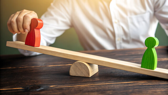 Conflict of interest: a wooden seesaw shows a balance problem, the figure standing on the balance in red and green symbolizes the competition and balance problem