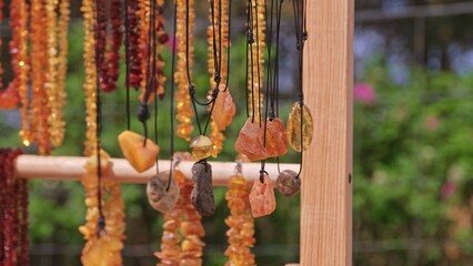 Valuable Jewellery Natural Amber Necklaces Sold on Outdoor Market Stand at Baltic Seaside Resort in Poland