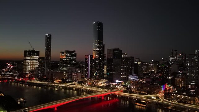 Brisbane CBD, Queensland, Australia: 4K Aerial Night Drone Footage Showing Skyscrapers, City Lights, the Wheel of Brisbane, Riverfront, South Bank, Traffic, and Bridges