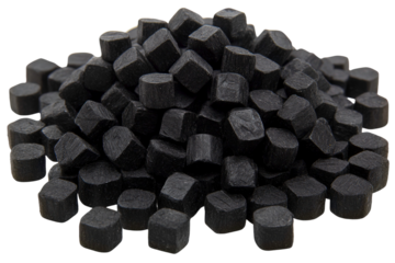 Pile of black charcoal cubes isolated on a white background for use in cooking, art, and industrial applications, showcasing a clean and modern design