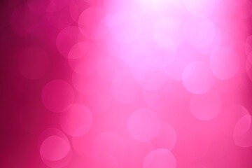 A pink background with a lot of small pink circles