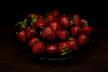 strawberries on a black background
