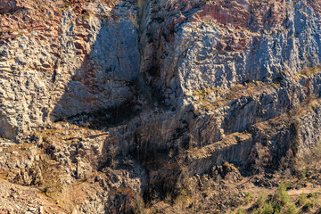 Majestic rocky cliff face with natural stratification and textures