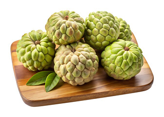 Fototapeta premium Close up of a group of fresh custard apples on wooden board
