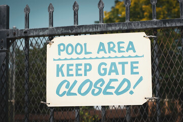 Pool area keep gate closed sign