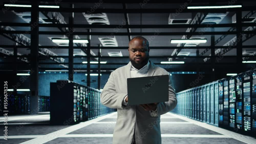 Poster data center computer scientist using laptop to manage system stability. server room it professional 