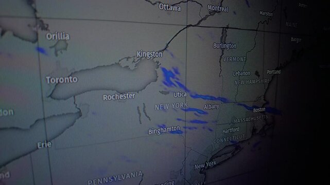 Footage shows a weather radar map. The map shows precipitation patterns over New York State and surrounding areas in the Northeast United States.