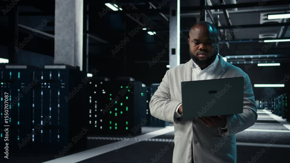 Poster data center it expert reviewing performance dashboards of equipment rigs. server room manager overse