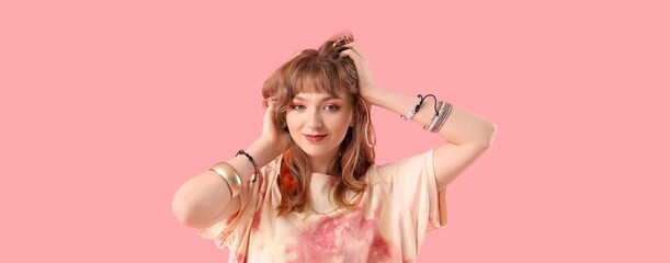 Female hippie on pink background