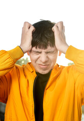 Young Latino Man Clutching Head: Expression of Stress / Headache Frustration
