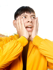 Young Latino Man Hands on Cheeks: Expression of Shock / Amazement
