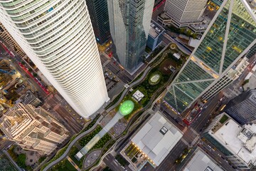 Aerial view of skyscrapers and a park in San Francisco, California, USA. The image shows the urban...