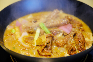 cooking Vanilla Duck in wok, food in Sanya,Hainan,China