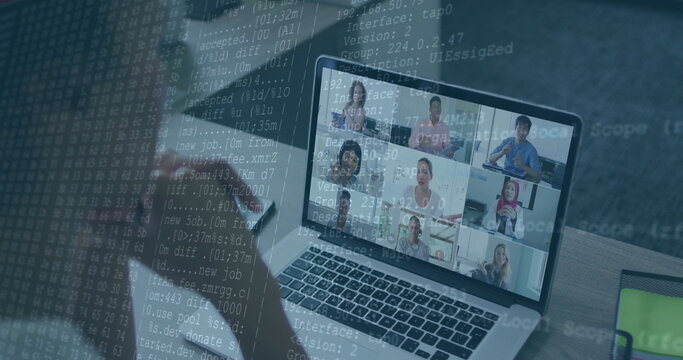Showing laptop displaying nine-person team meeting in office with smartphone and code overlay