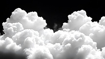 Dramatic white clouds on a black sky background create contrast scene