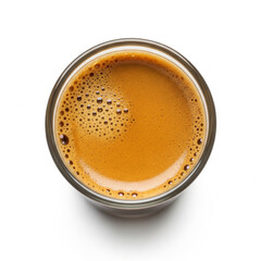 Top view of a glass shot of fresh espresso coffee with crema isolated on white background
