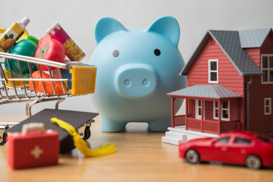Piggy bank and many expenses such as home mortgage loan, fuel, medical, car, education, foods etc. Cost of living rising in inflation or economy crisis, money saving, home finance and so on concept.