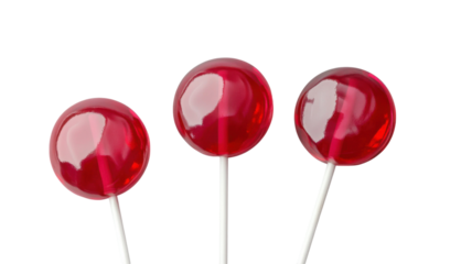 Bright festive red balloons flying in the air isolated on white background
