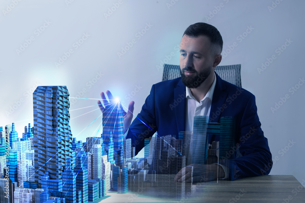 Poster building information modelling. man using holographic projection of city in office