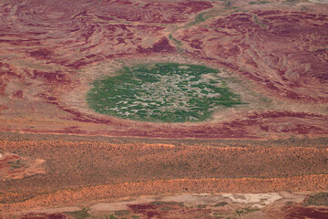 Desert dunes, gibber rock and vegetation