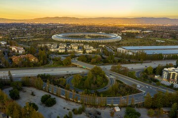 Aerial view of Apple Park headquarters in Cupertino, California, USA. The circular building is a...