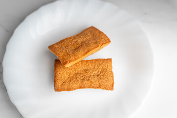 Financiers on White Plate①