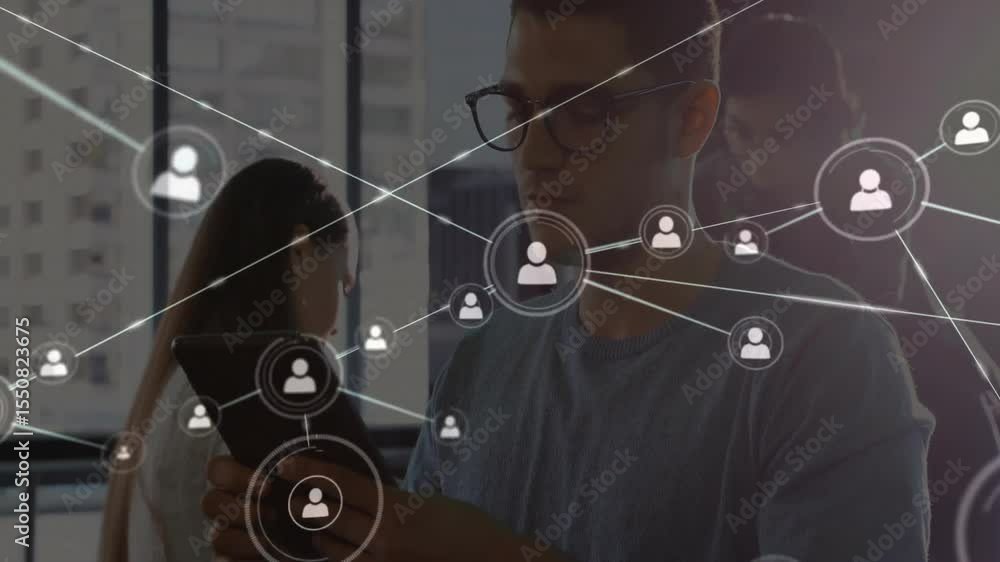 Poster seated man tapping tablet sparking animated avatar nodes forming business network behind coworkers
