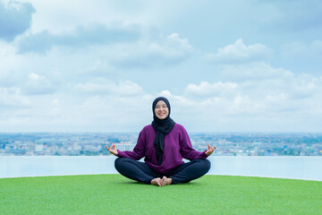yoga, Asian woman wearing yoga clothes practicing yoga, Asia group of women exercising healthy lifestyle in outdoor fitness studio. swimming pool. Sport activity, gymnastics or ballet dancing class.