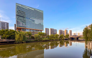 Modern architecture by the river in the city