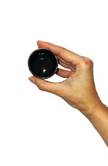 hand holding a sake cup