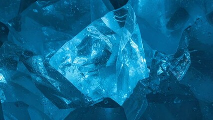 Close-up of shimmering blue ice crystals with intricate textures and reflections - Powered by Adobe