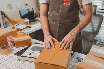 a small online business owner is checking boxes for accuracy before shipping to customers, parcel, an employee is packing products into boxes to prepare for shipping to customers