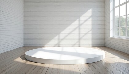 Empty white circular stage in a sunlit room with large windows