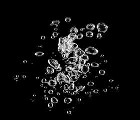 White water bubble liquid abstract isolated on a black background, with a texture drop small under the sea. Concept of designing oxygen air underwater, the effect of soda transparent. bubble in water