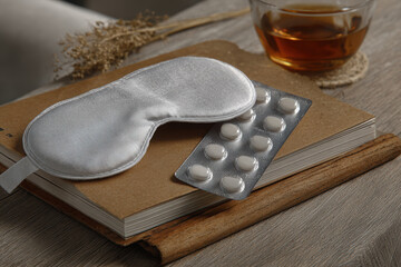 Health and relaxation items next to a torn journal page
