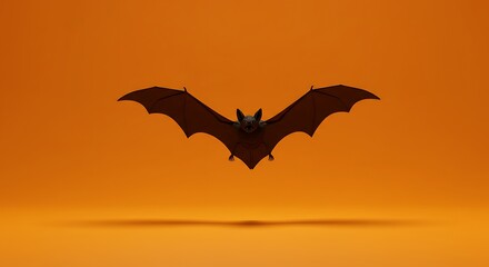 Naklejka premium Flying bat silhouette orange background