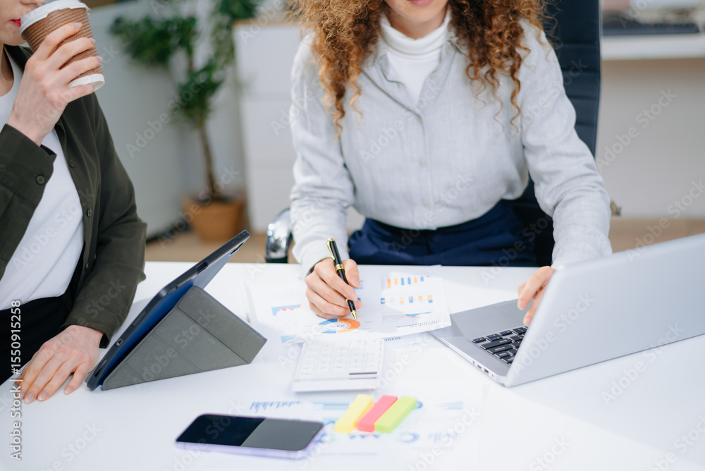 Poster business documents on office table with smart phone and calculator digital tablet and graph business