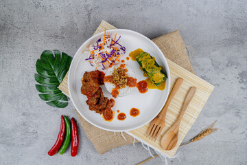 Buntil Beef Larva
A fusion dish combining savory spiced beef, rice, sambal, and a traditional...