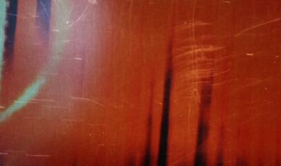 Colorful light leaks creating abstract background with film grain and texture