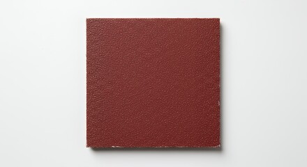 Fototapeta premium Maroon book on white background