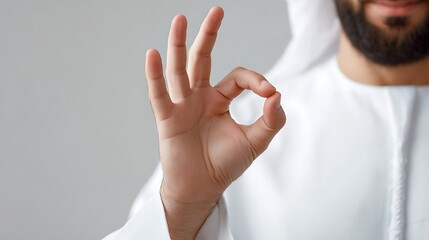 Close Up of Muslim Hands, OK or Delicious Gesture : Suitable for Be Used in Blog Posts, Social Media Posts or Website Content Related to People & Lifestyle Theme.