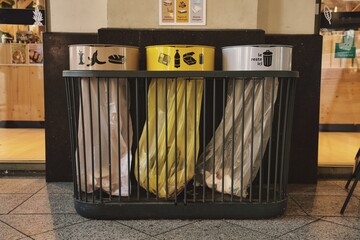 Lille, France - May 13, 2025: Colorful trash boxes in France

