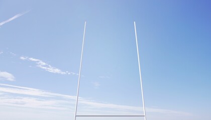 Flat design white metal goalpost is standing against bright blue sky with scattered clouds
