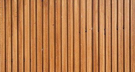 A textured background of vertical wooden planks in natural brown tones. 