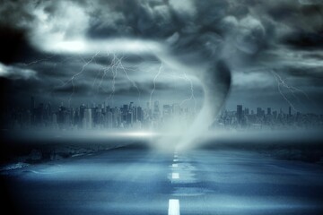 Stormy sky with tornado over road